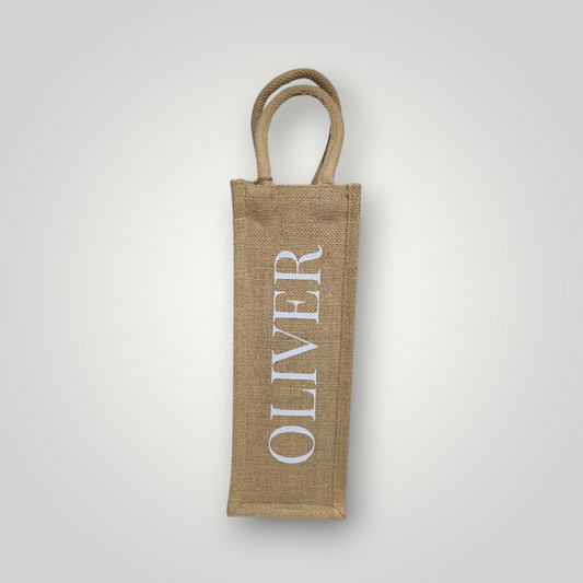 Personalised natural jute bottle bag with gold shimmer thread and name in white lettering